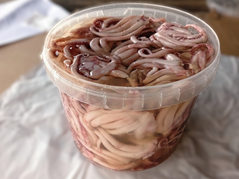 Щупальца кальмара в масле